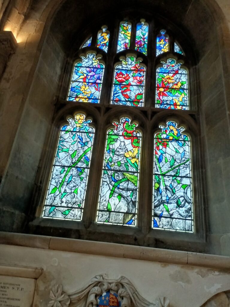 The modern St Frances window, the construction deliberately increases the colours higher up.