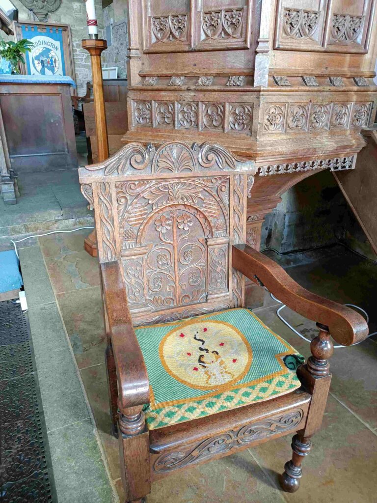 One of two beautifully carved chairs